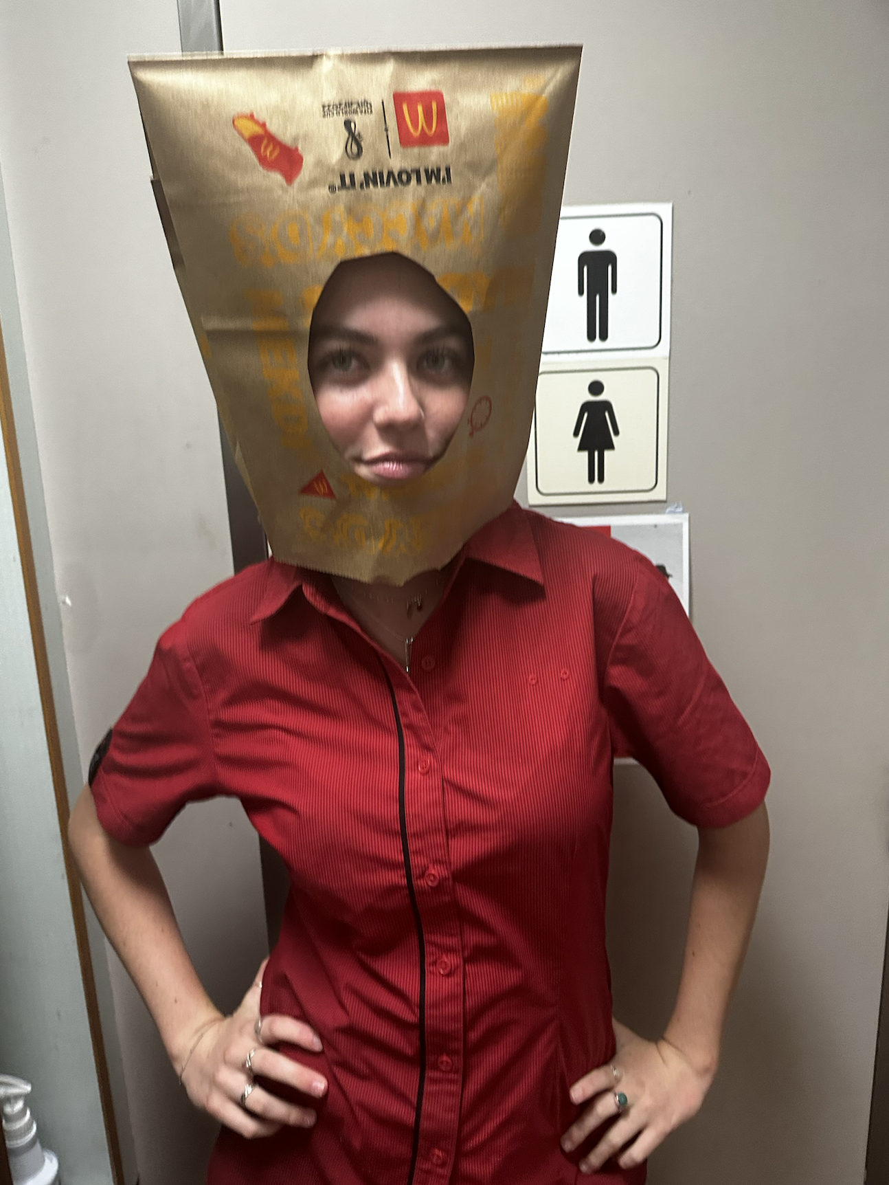 Jenna wearing a McDonalds paper bag on her head